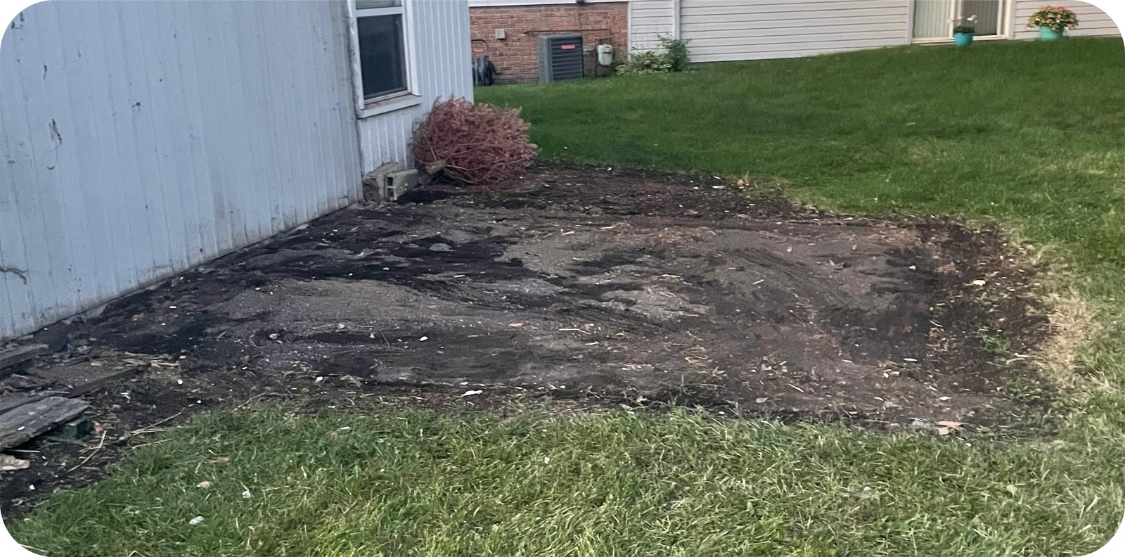 Clear ground after the shed was demolished and hauled away